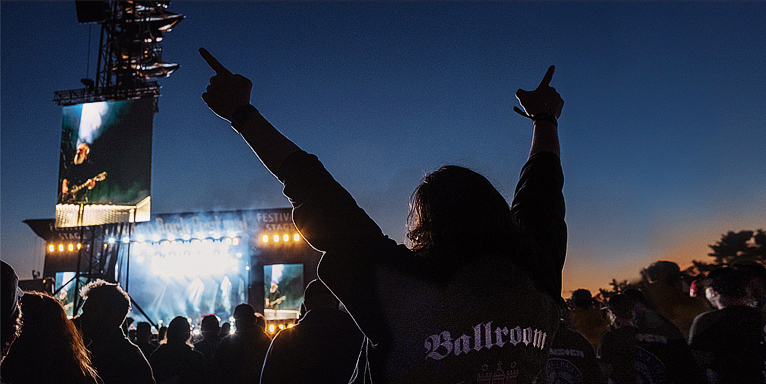rock concert with hands in the air